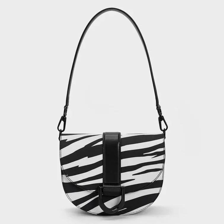 Charles & Keith Gabine Saddle Bag Zebra Print (Black)